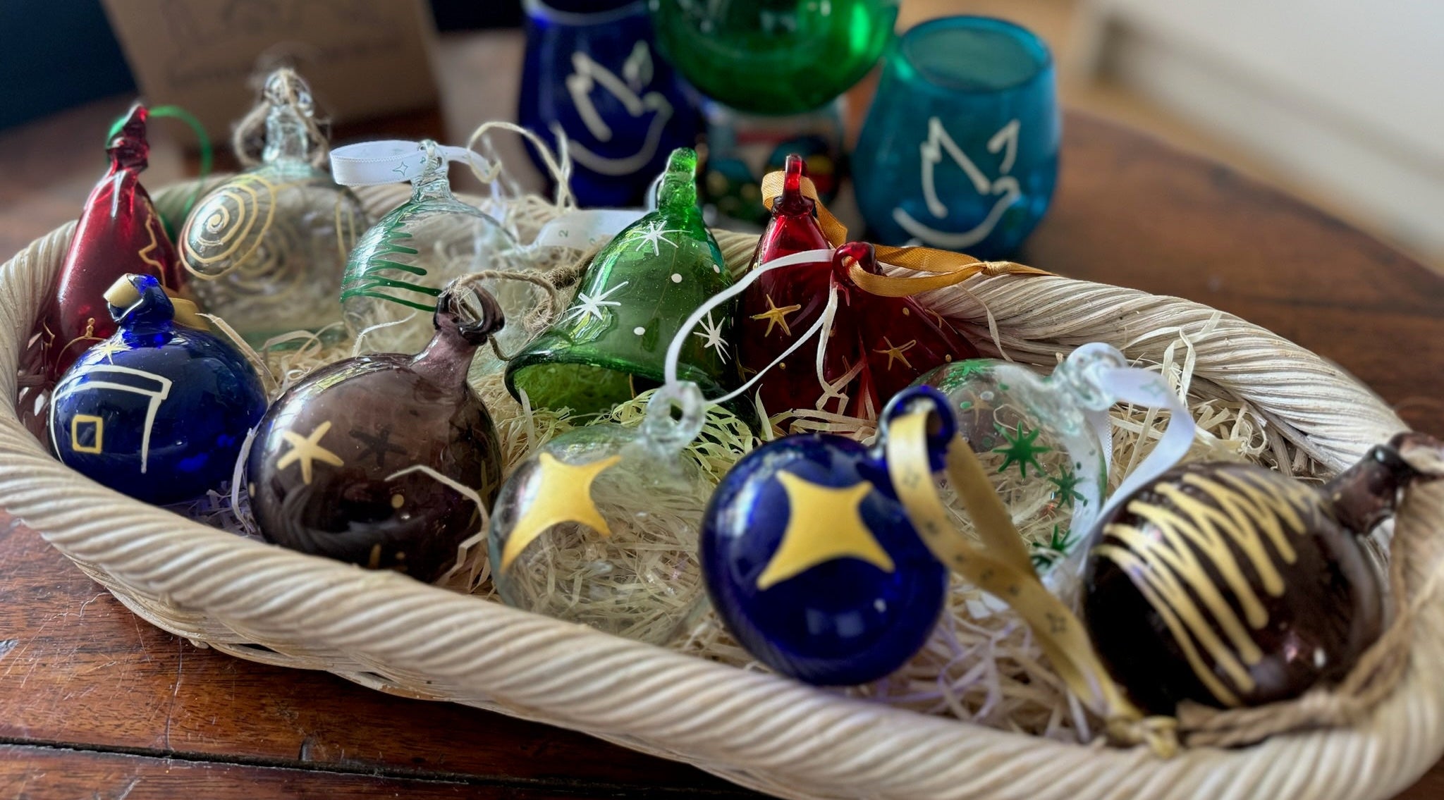 red, clear, green, plum, aubergine, blue, turquoise recycled glass decorations Christmas and easter.  Handmade in Bethlehem